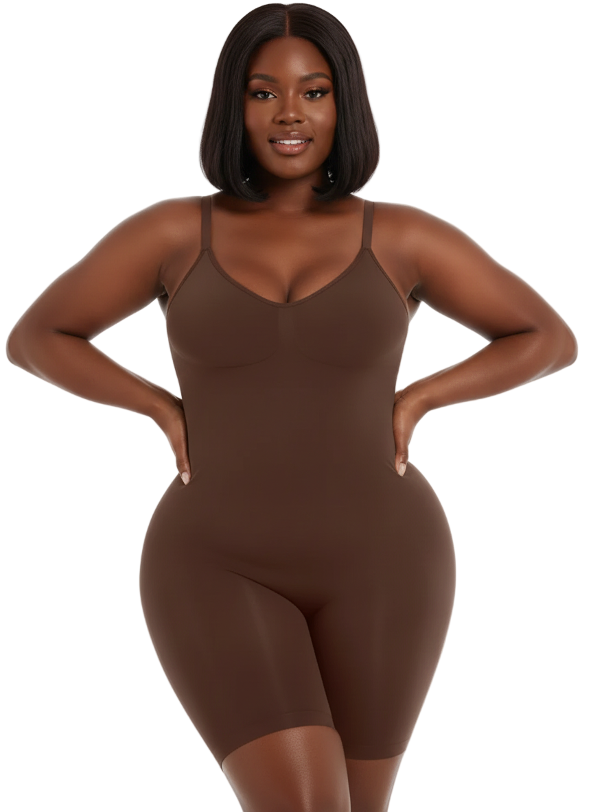 Woman wearing a brown bodysuit against a white background